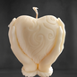 "Heart in Hand: Sculpted Candle"
