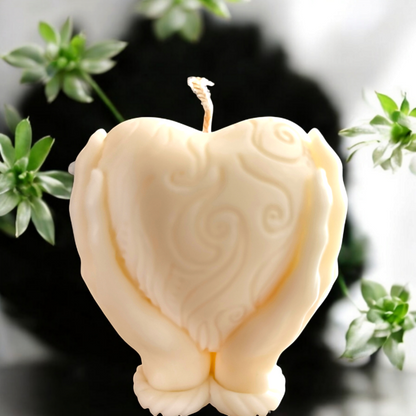 "Heart in Hand: Sculpted Candle"