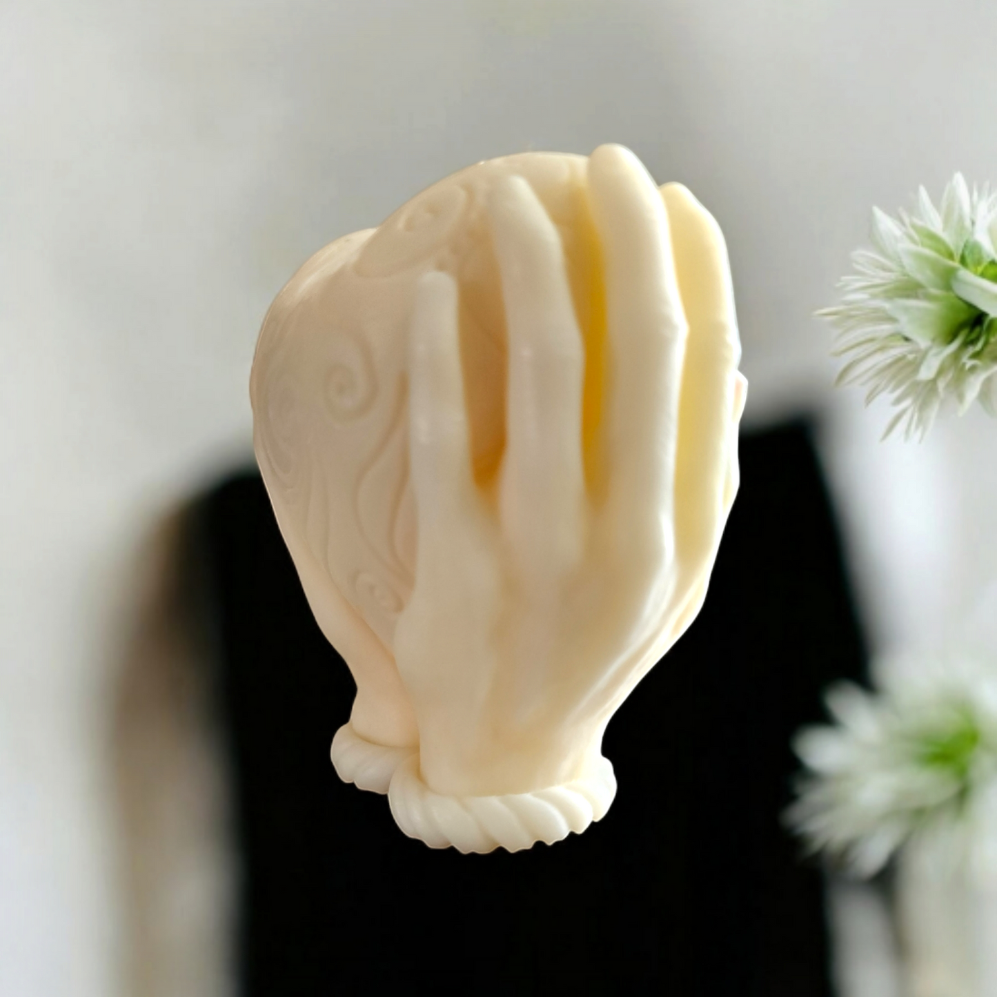 "Heart in Hand: Sculpted Candle"