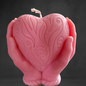 "Heart in Hand: Sculpted Candle"