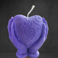 "Heart in Hand: Sculpted Candle"