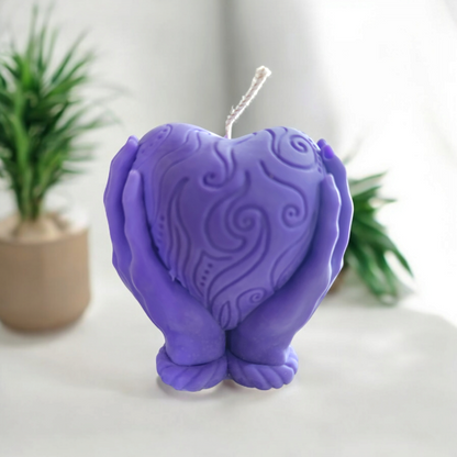 "Heart in Hand: Sculpted Candle"